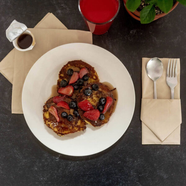 Differentiating Napkin Types: Placement, Material, & More 1 Bamboo napkins with French toast and reusable silverware